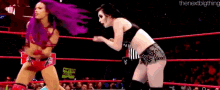 Sasha Banks Tilt A Whirl Headscissors Takedown GIF - Sasha Banks Tilt A Whirl Headscissors Takedown Paige GIFs