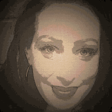 a drawing of a woman 's face with a smile