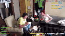 a man and a woman sit on a couch with a watermelon in the background