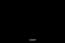 a man with a mustache is talking on a phone and says " hello cake "