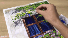 a person is painting a picture of a window and flowers with wow art written on the bottom