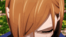 a close up of a girl 's face with her eyes closed and her hair visible
