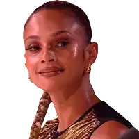 a close up of a woman 's face with a braided ponytail