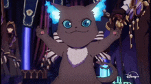 a cartoon cat with blue eyes and a disney logo in the corner