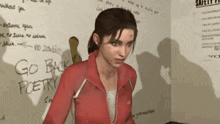 a woman in a red jacket is standing in front of a white board that says go back poetry