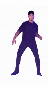a man in a black shirt and purple pants dancing