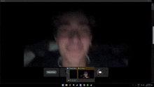 a computer screen shows a person 's face and says general on the top right
