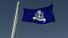 a blue flag with a crescent moon and a banner that says ' malaysia ' on it