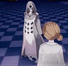 a woman in a white coat stands next to a man in a white hooded cloak