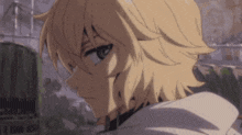 a close up of a person with blonde hair