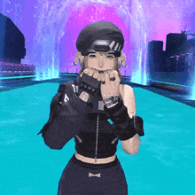 a girl with a beret and gloves is standing in front of a water fountain