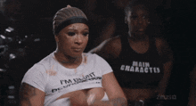 a woman wearing a white shirt that says i 'm blunt