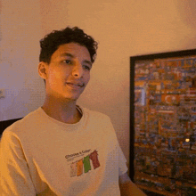 a man wearing a shirt that says choose a gummy bear