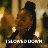a woman says i slowed down in front of a netflix logo