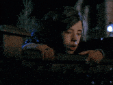 a woman is being held by a man with the words you killed norman below her