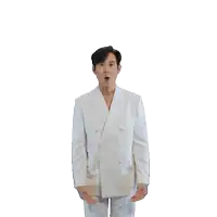 a man in a white suit has his arms outstretched in the air