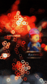 a blurred image of a pikachu with a hat on