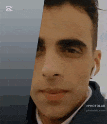 a close up of a man 's face with a half of his face missing .