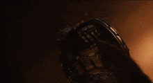 a close up of a person 's head with a shield