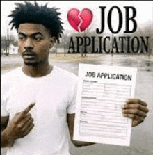a man is holding a job application with a broken heart .