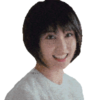 a woman with short hair and a white shirt is smiling