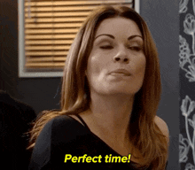 a woman with her eyes closed and the words perfect time above her