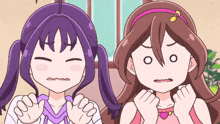 a cartoon of two girls with purple hair and brown hair
