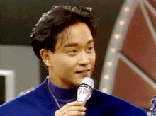 Leslie Cheung In Blue Leslie Cheung Interview GIF - Leslie Cheung In Blue Leslie Cheung Interview Leslie Cheung Talk GIFs