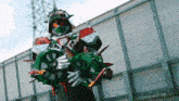 a samurai holding a sword and a steering wheel with the letter r on it