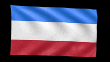 a red white and blue flag is waving in the wind on a black background