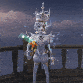 a statue of a woman with a crown on her head holding a wand