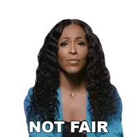 a woman in a blue jacket has the words not fair on her face