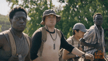 a movie poster for the long walk shows a group of young men standing next to each other