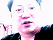 a close up of a person 's face with a pink lip and a black jacket