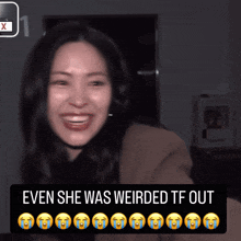a woman is smiling with a caption that says even she was weirded tf out