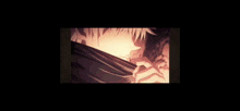 a close up of a person 's hair in a dark room