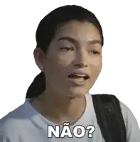 a woman with a backpack is making a funny face with the word não written on her shirt
