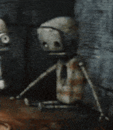 a blurred image of a robot with a cross in the foreground
