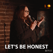 a woman stands in front of a microphone and says let 's be honest netflix