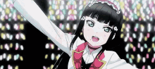 a girl in a maid costume is dancing on a stage with her arms outstretched .