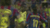 two soccer players one of whom is wearing a number 10 jersey