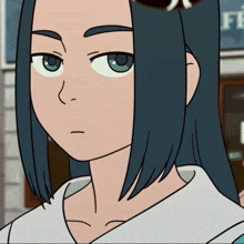 a close up of a cartoon character 's face with a sign in the background that says ff