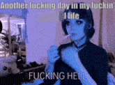 a girl smoking a cigarette with the caption another fucking day in my fuckin life fucking hell