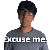 a man wearing glasses says " excuse me " in front of a white background