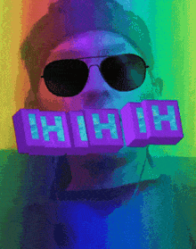 a pixelated image of a man wearing sunglasses and holding a sign that says hhh