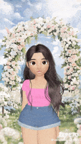 a girl in a pink top and denim shorts is standing in front of a floral arch