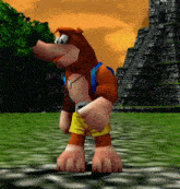 a cartoon bear with a backpack is standing in front of a stone pyramid