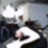 a blurry picture of a person 's face with a crown on their head