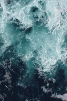 a close up of a body of water with waves
