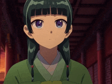 a girl with green hair and purple eyes is looking at the camera